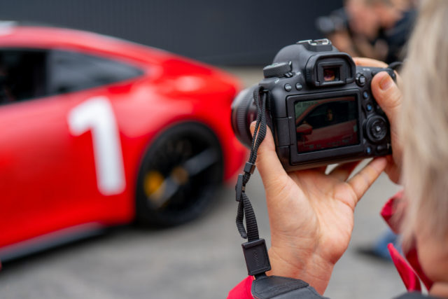 Moscow.,Russia.,August,13,2021,Photographer,And,Red,Car.,Professional